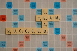 Scrabble Board with Lead Team Succeed
