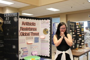 Hallee Babin, Fletcher Technical Community College MLT student, presents her topic at the Lab Fair