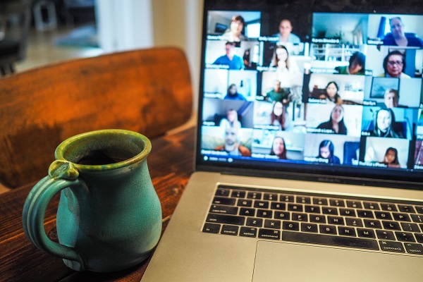 Online meeting with coffee mug