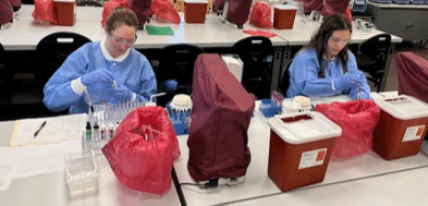McNeese State University MLS students conducting research in the lab