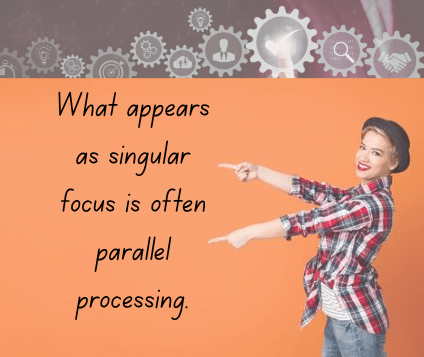What appears as singular focus is often parallel processing